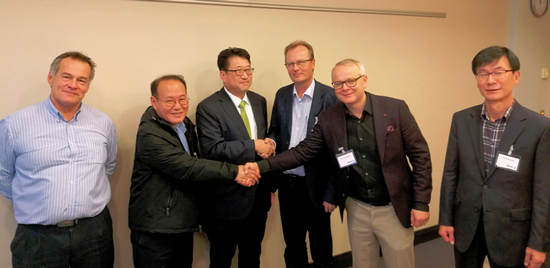 Shaking hands over the deal (from left): Timo Saresvuo (Valmet), Jin-Doo Kim, Yeon-Wook Jung (both from Ajin), Hannu T Pietilä, Sami Anttilainen and Tae-Yeon Kwon (all three from Valmet)